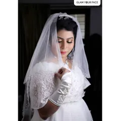 For my Christian brides, I love creating looks that are absolutely divine and ethereal. This makeover features a soft, shimmering eye and a classic pink lip, designed to complement the elegance of a white gown and veil. It’s all about timeless beauty.