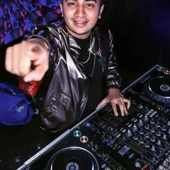 Pointing directly at the camera, inviting you to the party. This is the confidence and energy I bring to every single event.