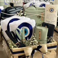 I love putting a modern twist on tradition, like with these Evil Eye Rakhi Hampers for your bhai and bhabhi. They are designed to offer protection and style, filled with personalized goodies for the coolest duo you know.