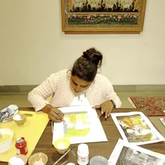 Here I am at a Pahari Miniature Painting workshop at Gyan Pravah, honing my skills. Continuous learning is a vital part of my journey as a traditional artist.
