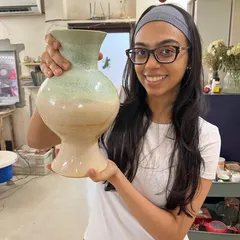 This is Hithika, one of our wonderful teachers, proudly holding a vase she threw on the wheel. Seeing students find their confidence and joy with clay is the most rewarding part of my work at Mitti Space.