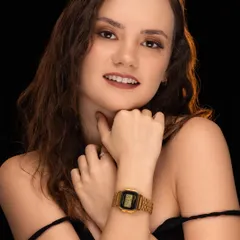 A close-up beauty shot that also serves as a product photograph for a classic gold watch. This demonstrates how I integrate accessories naturally into a portrait for brand campaigns.