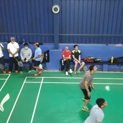 Action on the court while others watch from the sidelines. Our facility includes hangout zones, making it a great social spot for players and their friends to relax between matches.