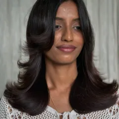 Another angle of the revitalized style, showing the beautiful shape and movement created by the new haircut.