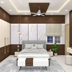 We transform bedrooms into personal sanctuaries. This design combines the elegance of marble-textured wall panels with the warmth of dark wood, complemented by custom wardrobes, a dedicated dressing unit, and soft ambient lighting for a truly luxurious feel.