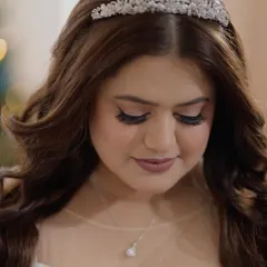 Turning bridal dreams into reality. These portraits showcase the elegance of a Christian bridal look, with a focus on soft, ethereal makeup and a timeless hairstyle.