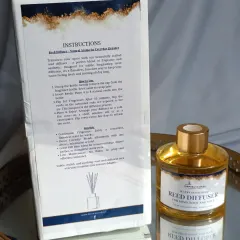 The back of the packaging provides clear instructions and benefits. It explains how to use the diffuser and highlights its long-lasting, flame-free, and handmade qualities.
