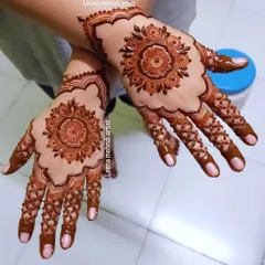 This beautiful mandala design is a popular choice for festivals like Eid or Diwali. It's intricate, celebratory, and looks stunning with festive outfits.