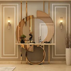 An abstract and artistic foyer design. The console table appears to be supported by a large golden ring, with a deconstructed mirror above it, creating a sculptural and memorable entrance.