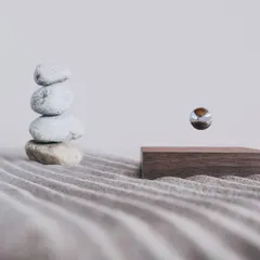 The Buda Ball, set in a tranquil zen garden, demonstrates its purpose as a tool for mindfulness. The chrome sphere levitates and spins, creating a hypnotic effect designed to calm the mind and encourage presence.