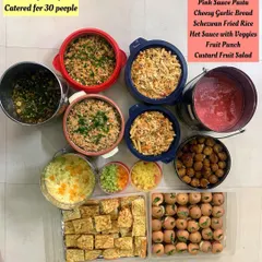 This was a fun birthday party I catered for 30 people. The menu included crowd-pleasers like Jain Pink Sauce Pasta, Schezwan Fried Rice, Mini Veggie Burgers, and Corn & Cheese Balls.