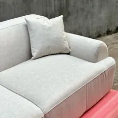 Another close-up of the sofa, highlighting the comfortable seating and backrest cushions.
