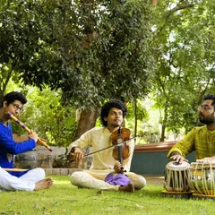 There is a special joy in creating music outdoors with friends. Here I am in a jugalbandi session with Hrishikesh Majumdar on violin and Sumanth Manjunath on flute, blending our instruments together in a beautiful natural setting.