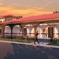 The design for the UNACCO School's primary block in Mamangpat features a rhythmic series of arches, creating a sheltered walkway that is both functional and aesthetically pleasing.