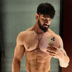This is the level of core and upper body definition we work towards. It's achieved through a combination of strength training and a disciplined nutrition plan.