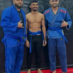 Three of our dedicated BJJ practitioners. The camaraderie and mutual respect in our grappling classes are key to everyone's growth.