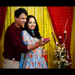 There is something so special about celebrating Diwali. This was a candid moment with my husband during our own festive photoshoot. I use warm lighting and traditional backdrops with props like diyas to capture the beautiful, intimate moments of celebration for couples and families.