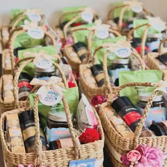 Pure love in a basket, curated as a token of joy for a baby boy's arrival. These 30 hampers were filled with Theobroma cookies, Davidoff coffee, and a scented candle.