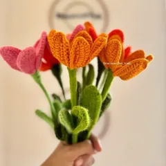 A side view of the open tulip bouquet, highlighting the shape of the petals and the delicate, curly leaves I add to each stem for a more realistic touch.