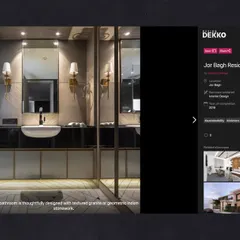 A screenshot of the Jor Bagh bathroom from its feature on Design Dekko, highlighting the textured granite and geometric floor pattern. The design showcases our attention to material detail.