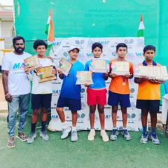 Celebrating our champions at the MAT Open Independence Day Cup. It's a joy to see our players' hard work pay off as they stand together with their well-earned trophies and certificates.