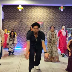 Here I am, Rahul, leading a workshop and breaking down the steps for our enthusiastic students. My goal in every class is to make sure everyone is learning, smiling, and feeling the music.