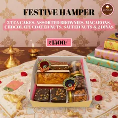 The Festive Hamper is a popular choice, containing two tea cakes, assorted brownies, macarons, chocolate-coated nuts, salted nuts, and two beautiful diyas, all packed in a festive box.