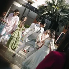 A candid moment of the couple dancing with their friends during their Haldi ceremony. We encourage these spontaneous dance moments that make for the best pictures and memories.