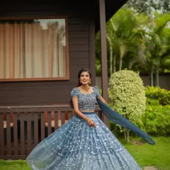 A happy, twirling shot from an engagement ceremony. The bride is wearing a beautiful blue lehenga, and I created a fresh, day-time appropriate makeup look with a simple hairstyle.