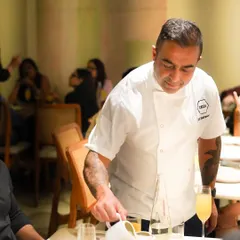 Our talented chef, Sunil, in action during the collaborative dinner with Chef Sid Sahrawat. His passion and expertise shine through in every dish he creates.