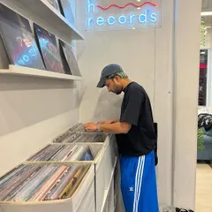 Digging for gems at H Records. There's nothing like the feeling of finding a rare vinyl to add to the collection.