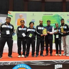 Our Team Legends stands proud after a successful campaign at the Senior Nationals Kickboxing Championship. We are holding the team trophy, a symbol of our collective hard work and dominance in the sport.