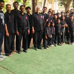 Our academy is a family. This photo from a belt test day shows our diverse community of men, women, and children, all training and growing together. Everyone is welcome here, regardless of age or experience.