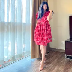 A closer look at the details of my red Ikat ruffle dress. The fit-and-flare silhouette combined with the traditional fabric creates a look that is both modern and deeply rooted in our heritage.