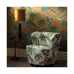 Tropical prints bring life and character into any home. Here, a palm-print wallpaper and matching armchair upholstery create an immersive, verdant escape. I can source a wide array of tropical and floral designs to suit your vision.