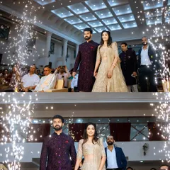 The grand entrance of the couple at their reception. I captured this moment with sparklers creating a tunnel of light, highlighting the grand scale of the hall and the excitement of the guests.