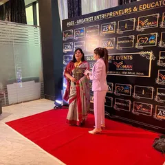 On the red carpet, feeling grateful for the recognition of my work. It is a privilege to be part of the Woman Leaders Forum.