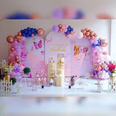 I love creating modern decor for traditional events like this Annaprashan, or rice ceremony. This elaborate butterfly theme uses multiple backdrops, custom butterfly wing cutouts, and a soft pink and lavender color scheme to create a magical setting.