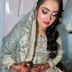 A beautiful pastel green outfit called for a fresh and dewy makeup look. I used soft pink and silver tones on the eyes to complement the embroidery on her dress.