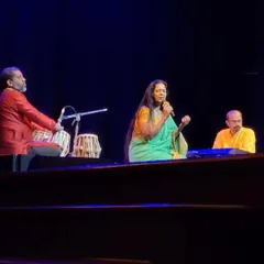 A wider view of the stage during the concert for special children. I curated a setlist of songs about the moon, rainbows, and little Krishna to create a magical experience for them.
