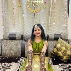 A happy client showcasing her full-arm 'Vithu namachya rangat' mehandi design. This piece is perfect for religious ceremonies, festivals, or as a unique bridal design.