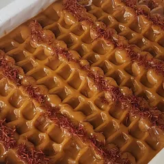 This is a close-up of my Turmeric Saffron soap loaf, a consistent top-seller for my wholesale partners. The rich color comes from turmeric, and the red strands are pure saffron, offering both visual appeal and skin-brightening benefits.