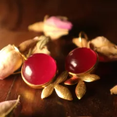 A bloom of red and gold for the goddess of the night. These sterling silver studs with 18k gold plating are fierce and tender, just like a rose bud.