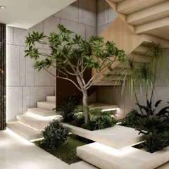 I believe transitional spaces should be experiential. Here, an indoor garden is integrated directly into the staircase, transforming the act of moving through the home into a moment of connection with nature. Backlit steps and raw concrete walls complete this serene composition.