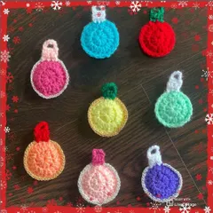 These colorful, round bauble ornaments are a modern take on a classic decoration. I make them in a rainbow of colors to brighten up any Christmas tree.