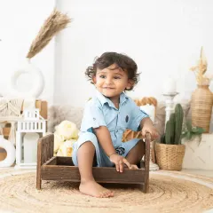 We have over 40 themes to choose from for toddler sessions, or we can create a custom setup just for you. This little one is enjoying our boho-chic set.