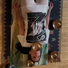 Here, I have placed bowls directly on the body's energy centers, or chakras. This technique allows for a more intense vibrational transfer, which is excellent for unblocking stuck energy and promoting a deep chakra cleanse.