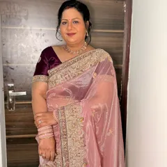 The client smiling, looking confident and beautiful.