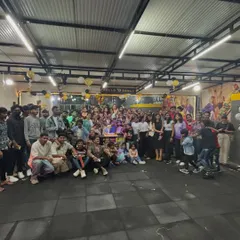 A full-studio group photo from our anniversary event. It's amazing to see how much our community has grown over the years.