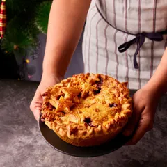 Our Strawberry Balsamic Pie, ready to be the centerpiece of your holiday table. The golden, flaky crust is decorated with pastry snowflakes, making it as beautiful as it is delicious.